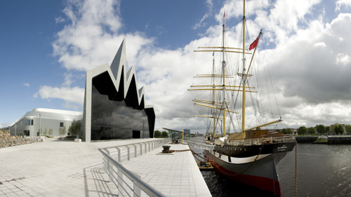 Riverside Museum exterior with Tall Ship Glenlee on a sunny day