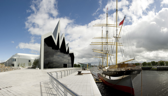 Riverside Museum exterior with Tall Ship Glenlee on a sunny day