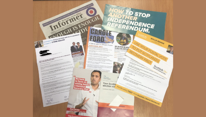 Leaflets spread out on a table