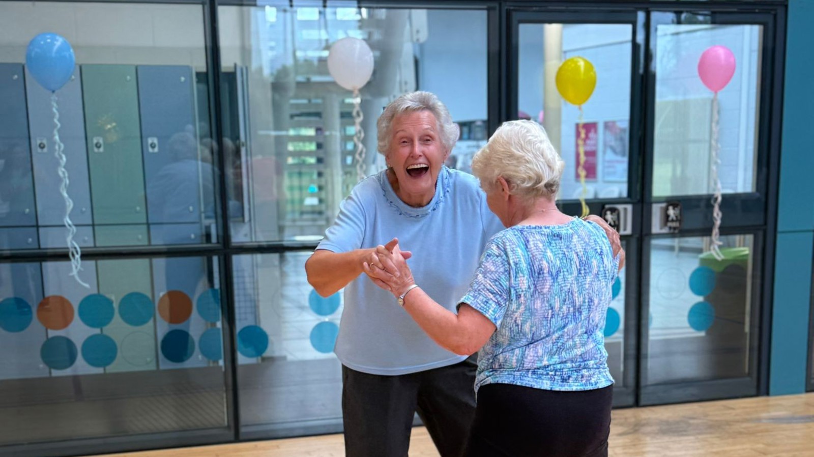 Two women dancing at the social dance at Glasgow Club Donald Dewar