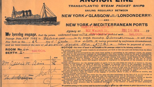 A photograph of a ticket for the Anchor Line ship from Glasgow to New York via Londonderry. The ticket is orange and has a drawing of a steamship in the top left-hand corner. The handwriting on the ticket shows that it is valid for one adult on the ship 'Cameronia'. A red stamp on the ticket shows that it is for Saloon class. 