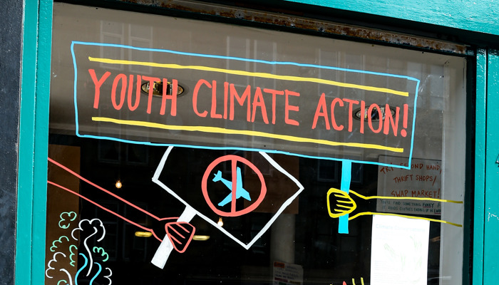 Swap Market's window, showcasing a climate action display