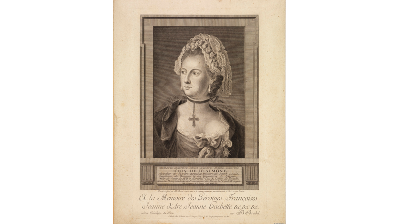illustration of woman in flamboyant dress. Engraved portrait of a person shown from the chest up, facing slightly to the left, wearing a lace-trimmed cap, earrings, and a ribbon choker with a cross pendant. The portrait is set within a decorative rectangular frame. Beneath the image, printed text identifies “D’Eon de Beaumont” and includes a French dedication beginning “À la Mémoire des Héroïnes Françoises,” followed by additional descriptive text.