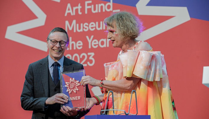 Duncan Dornan is on the left receiving the 2023 Art Fund Museum of the Year prize for Glasgow’s Burrell Collection from artist Sir Grayson Perry at a ceremony at the British Museum in London.
